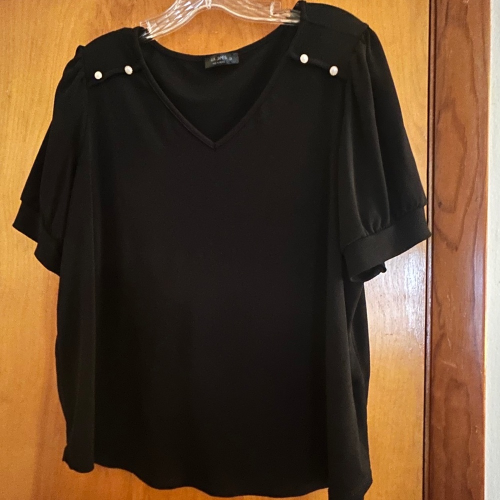 Black short sleeve top with button design on shoulder